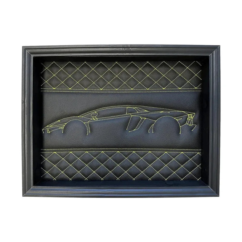 Framed black leather wall art with yellow stitching