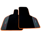 Custom Black Floor Mats for Lamborghini Huracan STO with Black Leather and Orange Trim