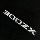 Black Floor Mats For Nissan 300ZX (1990-2000) with White Trim - AutoWin