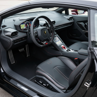 Schwarze Fußmatten aus Carbonfaser für Lamborghini Huracan STO